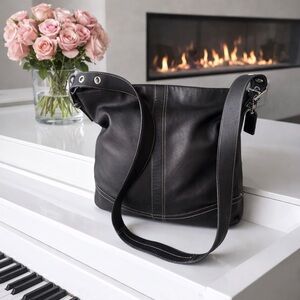 Coach Soho 2007 Vintage Slim Duffle Elegant Black Leather Bag.